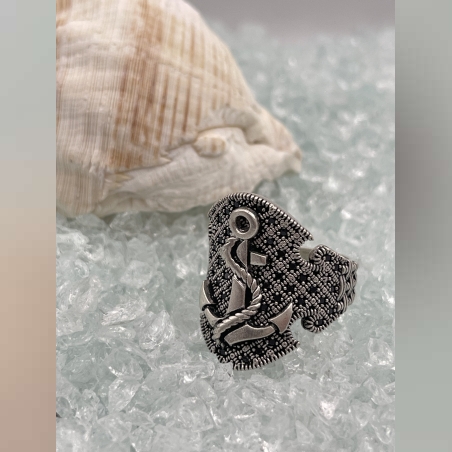Silver anchor ring set with black zircons