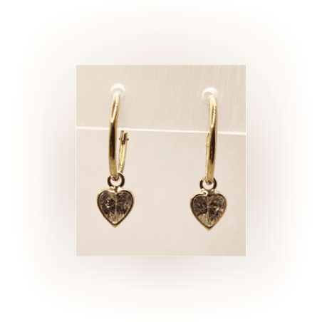 14K gold hoop with a pendant element of a heart inlaid with zircon
