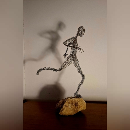 פסלון אני רץ