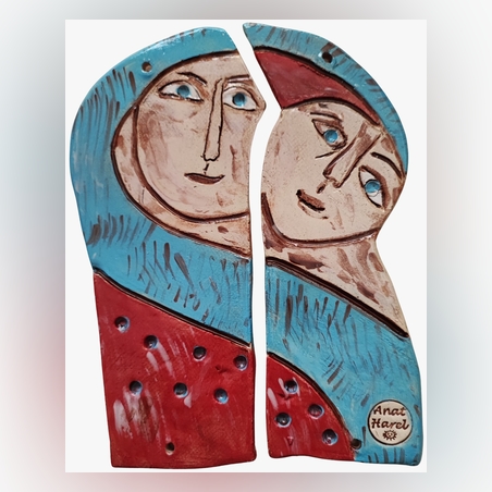 תמונת תבליט חצויה של שני פנים