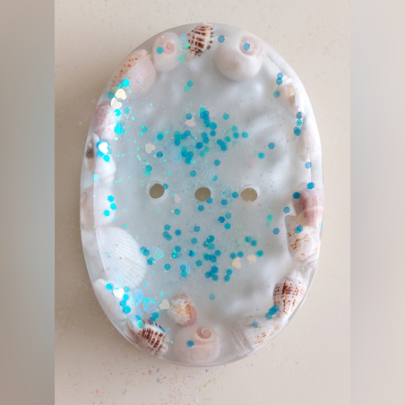 סבוניה אליפסה עם צדפים מחוף הים