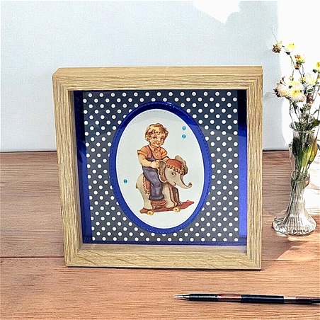 תמונת וינטג' מנייר בעבודת יד- ילד ופיל