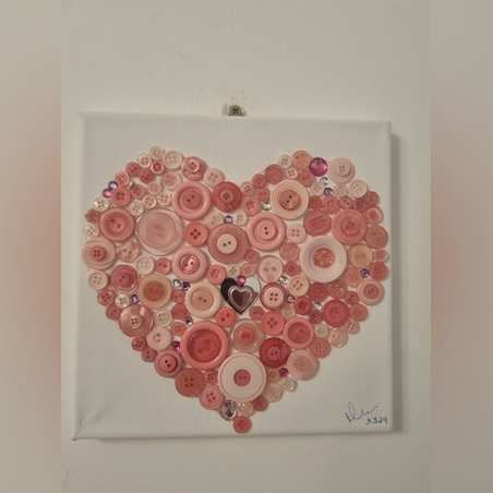 אומנות כפתורים ורודים על קנבס