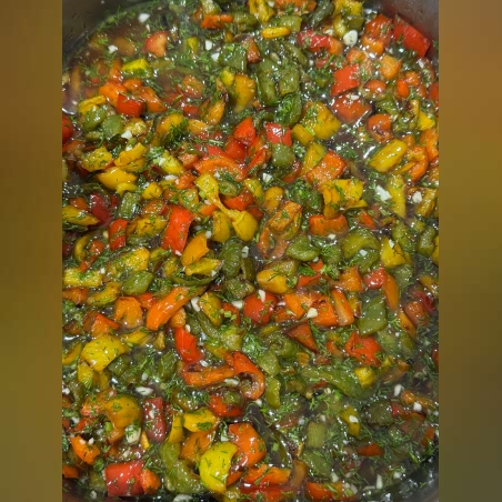 Diced colorful peppers in pickle