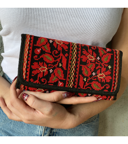 Embroidered purse with red flowers