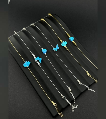 צמיד אופל עם מגוון צורות בכסף וגולדפילד