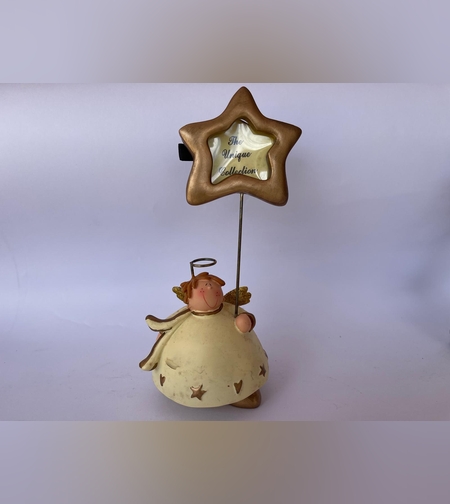 פסלון דקורטיבי של מלאך המחזיק מעמד בצורת כוכב המיועד להצגת תמונה או כרטיס.