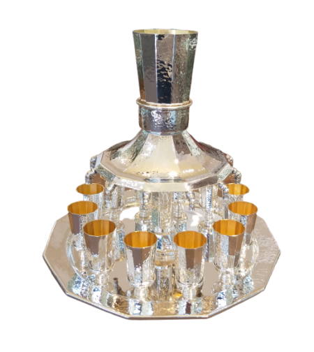 A pure silver wine dispenser for 12 diners