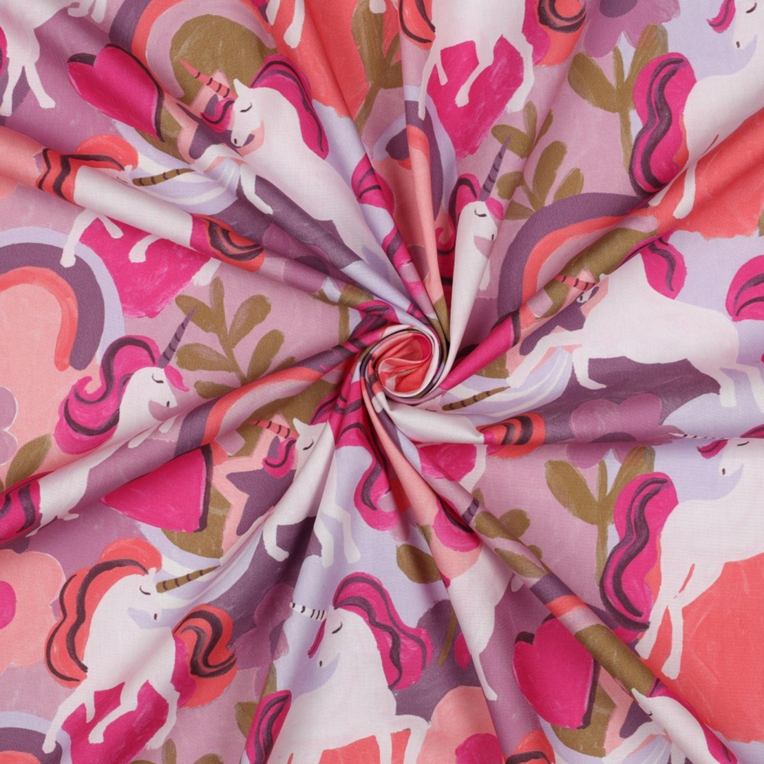 אריג כותנה דפוס דיגיטלי חד קרן בגווני ורוד