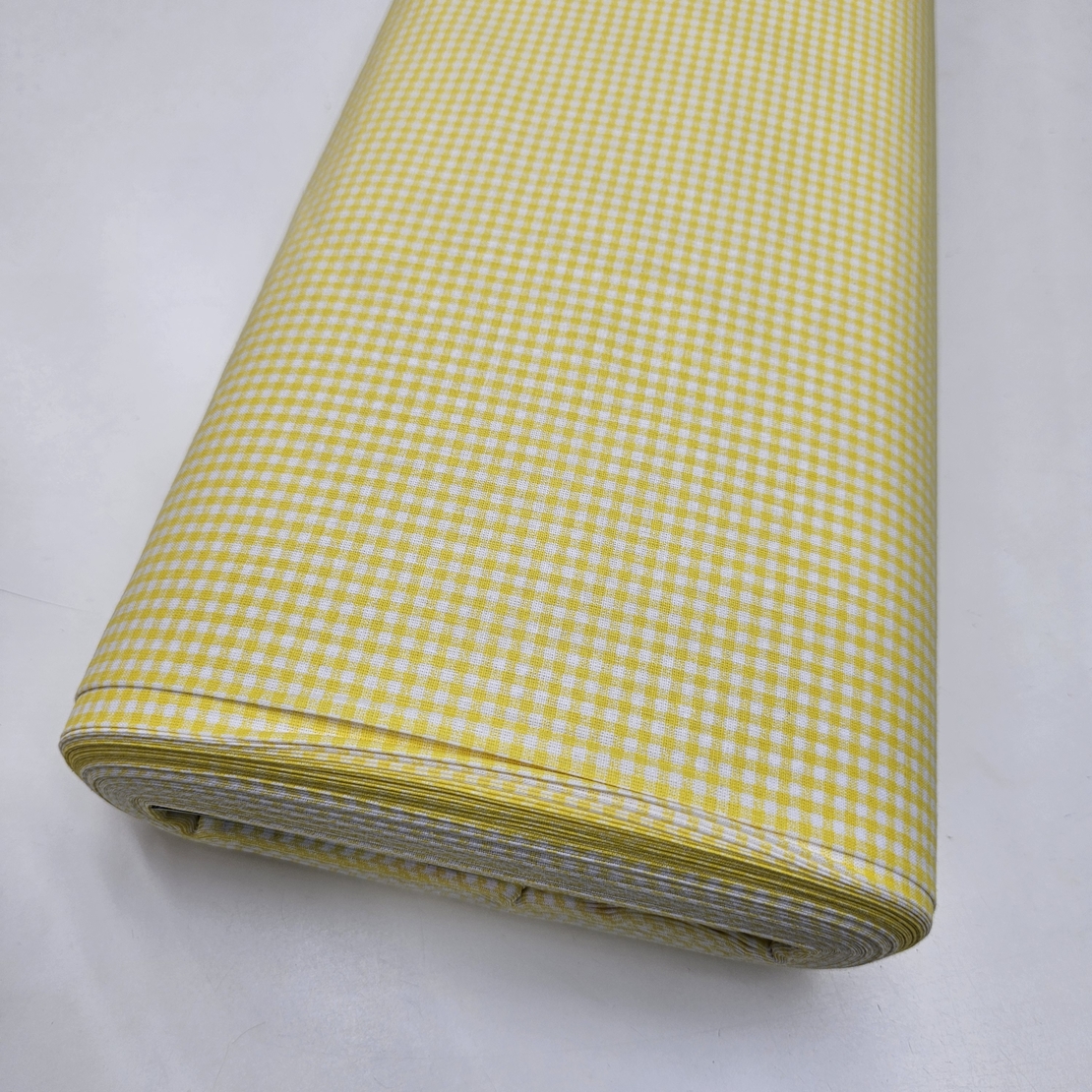 אריג כותנה משבצות פפיטה גווני צהוב לבן