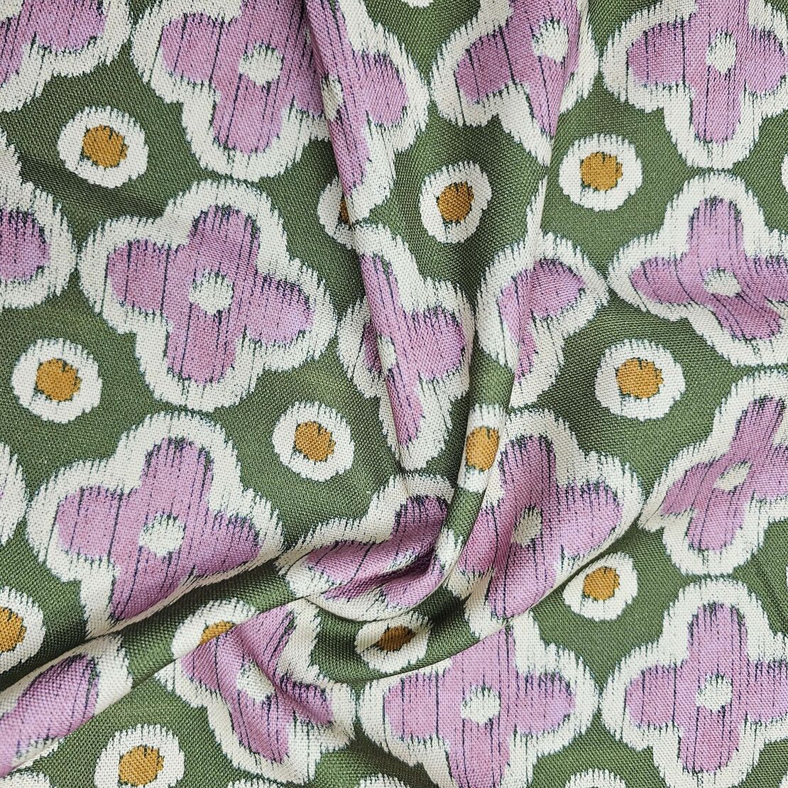 אריג קנבס דפוס פרחים גווני סגול רך וירוק דגם שיר