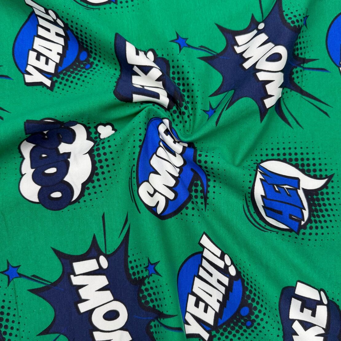 בד פוטר דפוס קומיקס על רקע ירוק