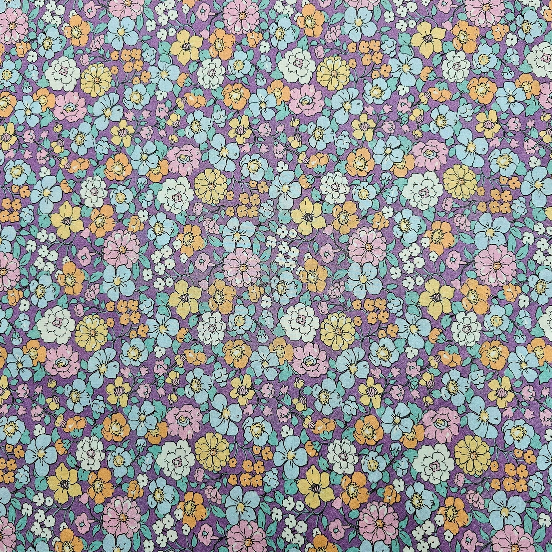 אריג כותנה אורגני דפוס פרחי שדה על רקע סגלגל