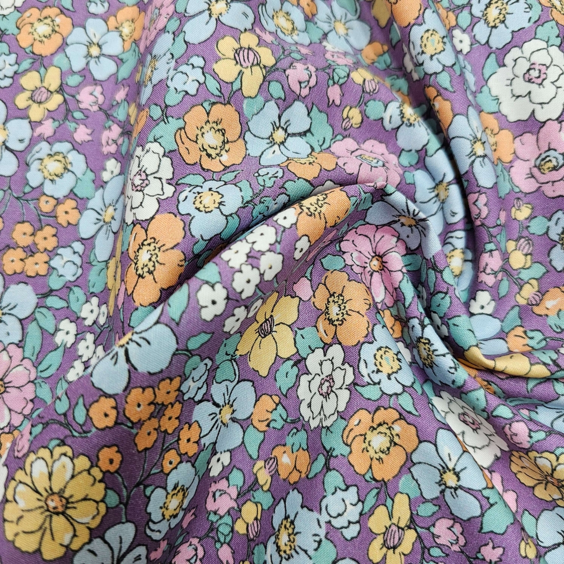 אריג כותנה אורגני דפוס פרחי שדה על רקע סגלגל