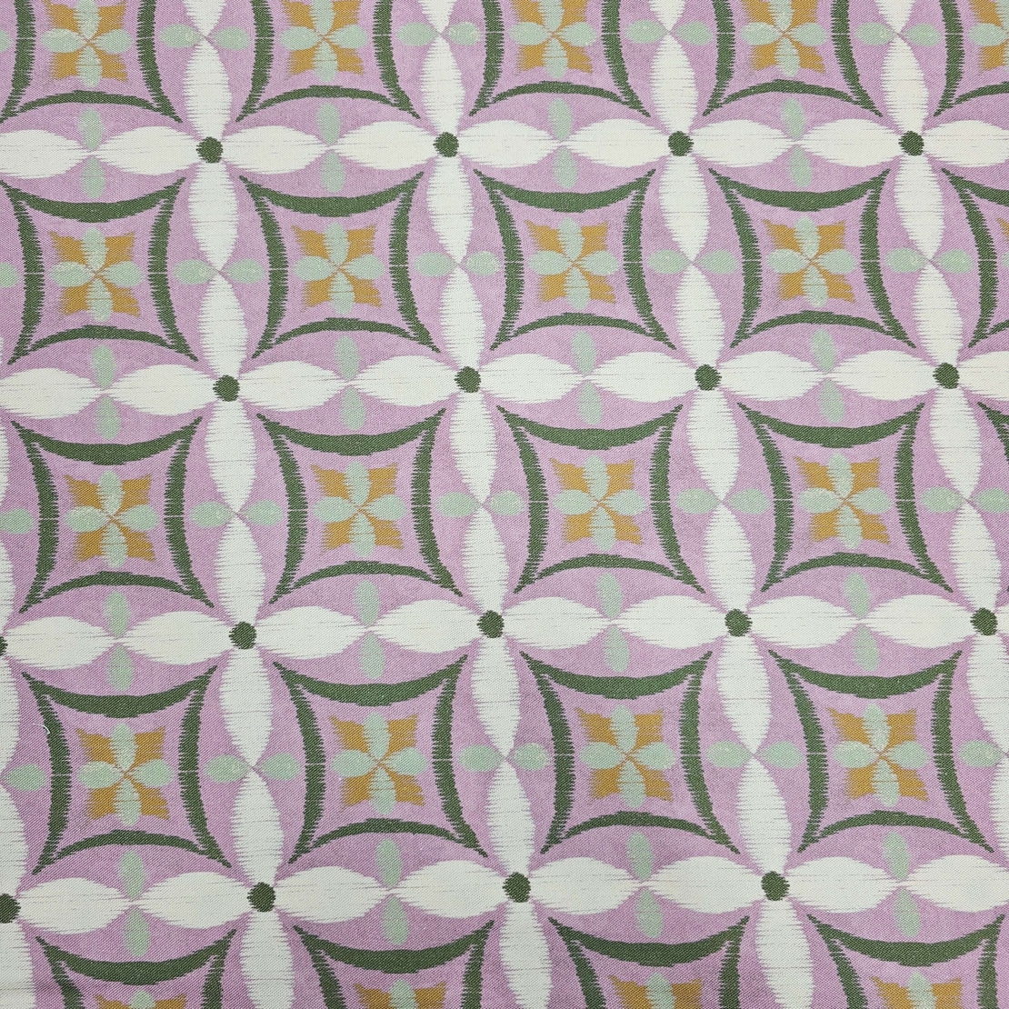 אריג קנבס דפוס פרחים אבסטרקטי גווני ירוק וסגול רך דגם קלודין