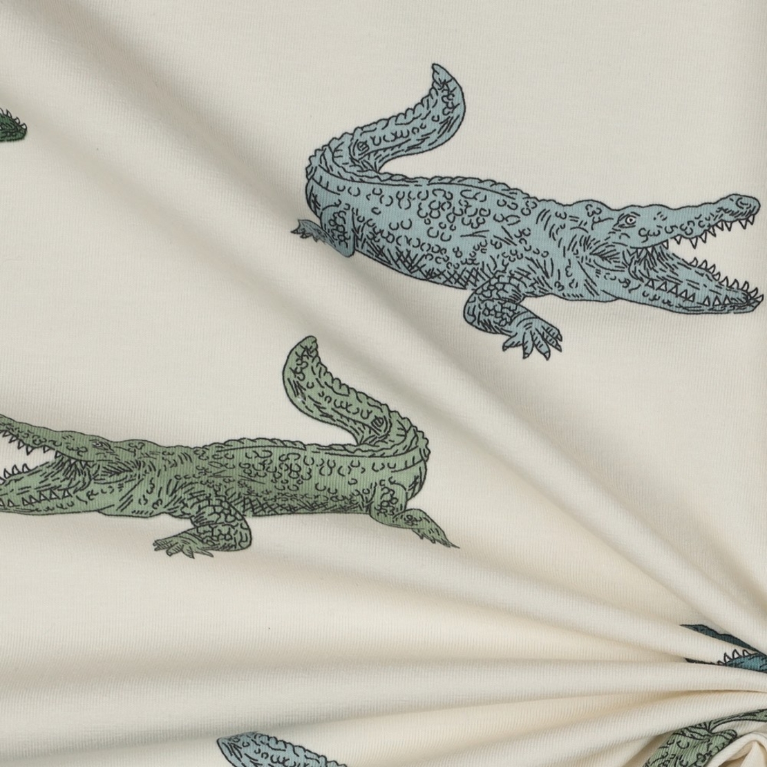 טריקו דפוס תנינים על רקע אופוייט