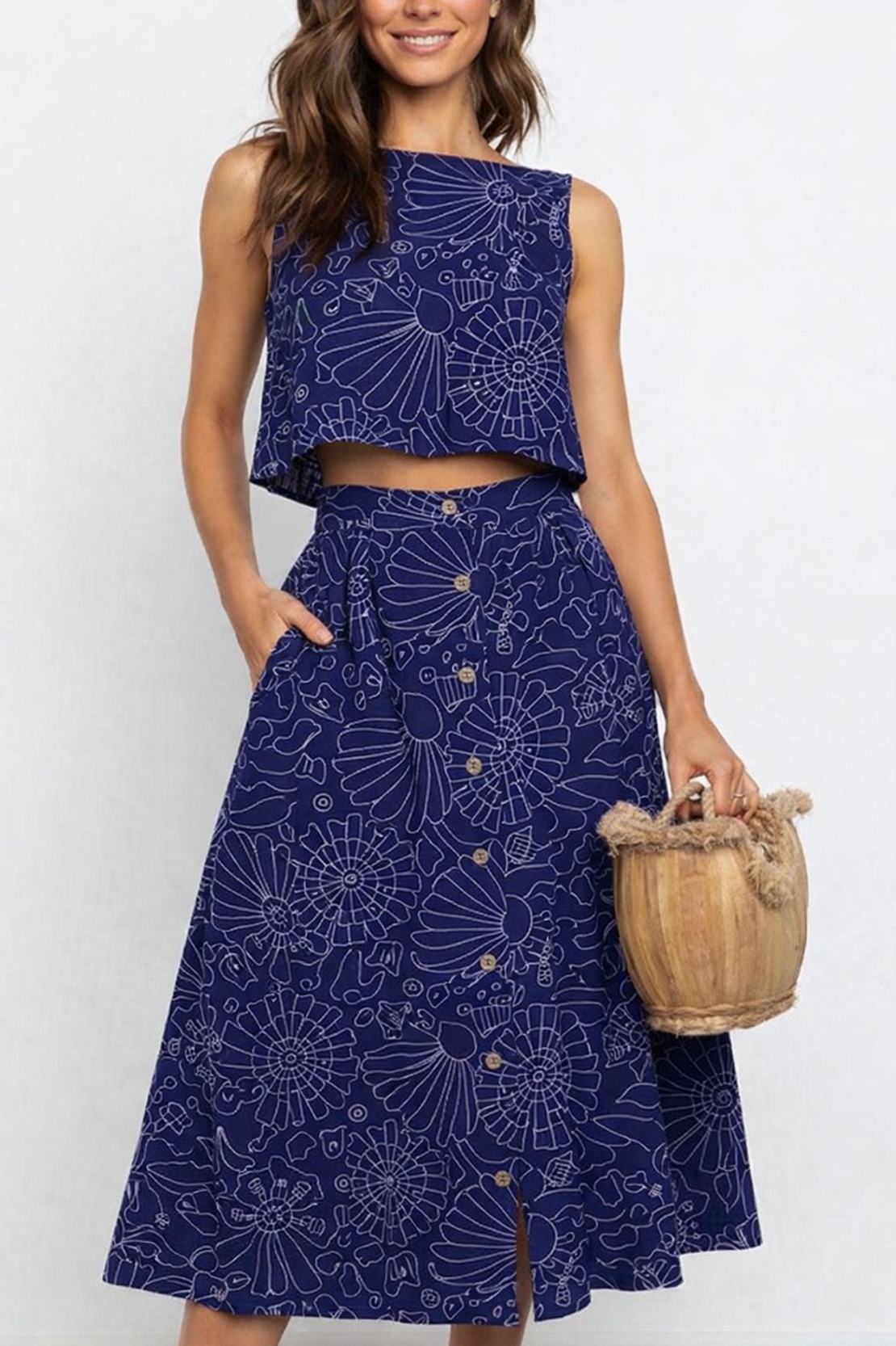 אריג כותנה דפוס פרחי עדן על רקע כחול נרידה הנסן