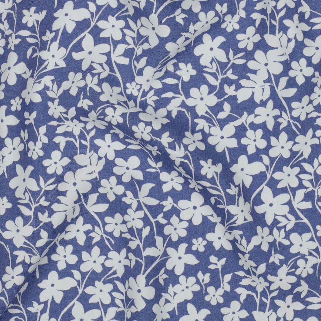 אריג ויסקוזה דפוס פרחים קטנים על רקע כחול גינס דגם חן