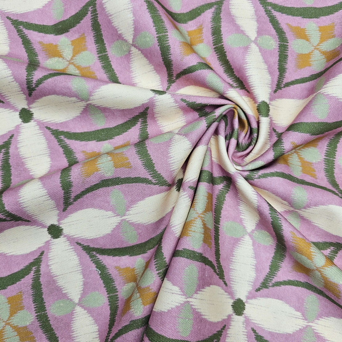 אריג קנבס דפוס פרחים אבסטרקטי גווני ירוק וסגול רך דגם קלודין