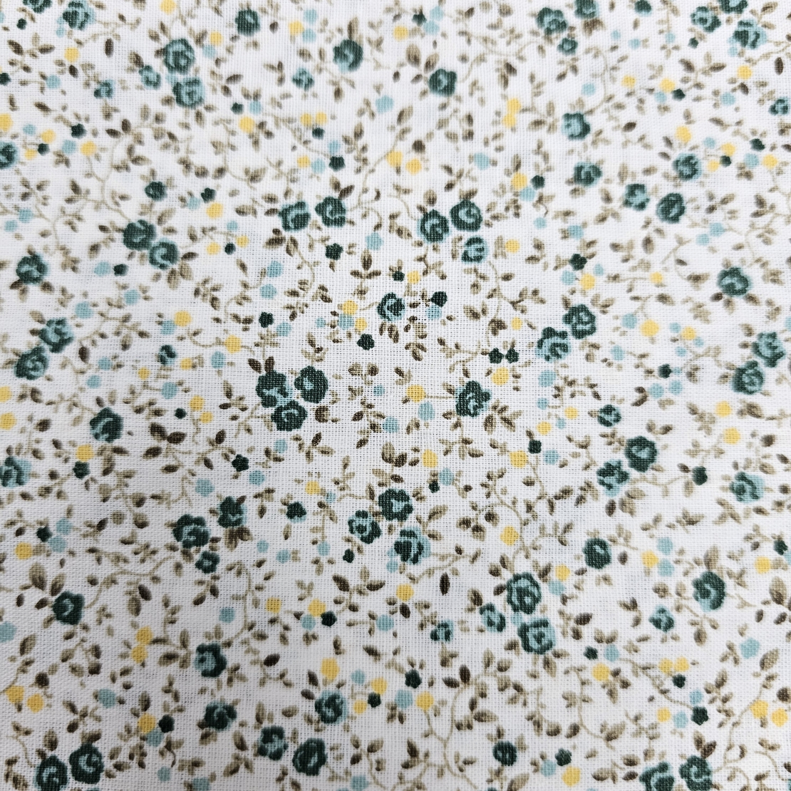 אריג כותנה פרחים קטנים בגווני ירוק דגם שרון