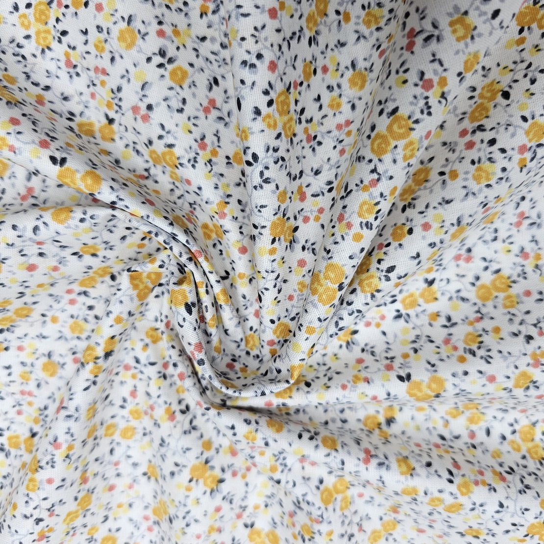 אריג כותנה פרחים קטנים בגווני צהוב דגם שרון