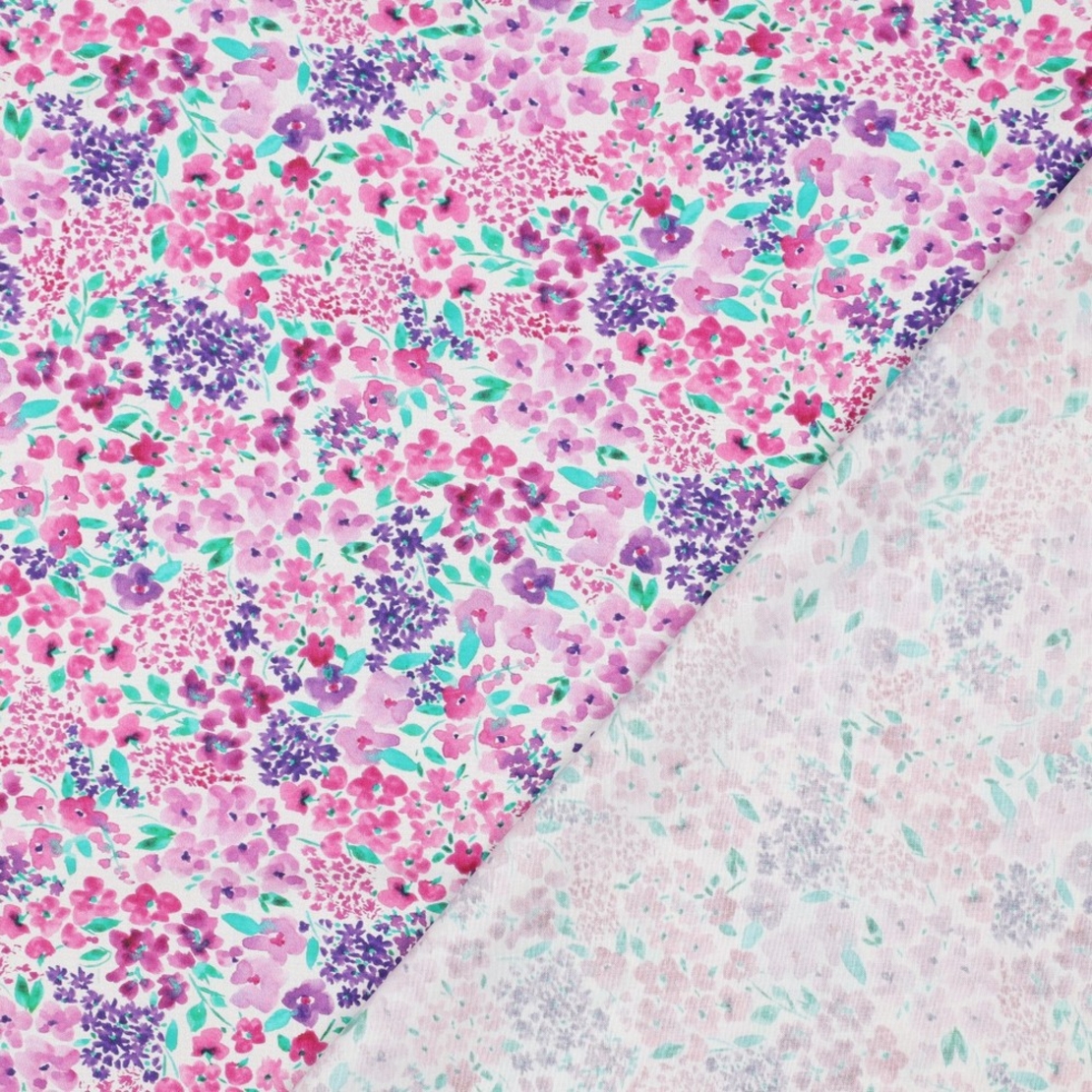 אריג כותנה דפוס פריחה מרהיבה על רקע לבן