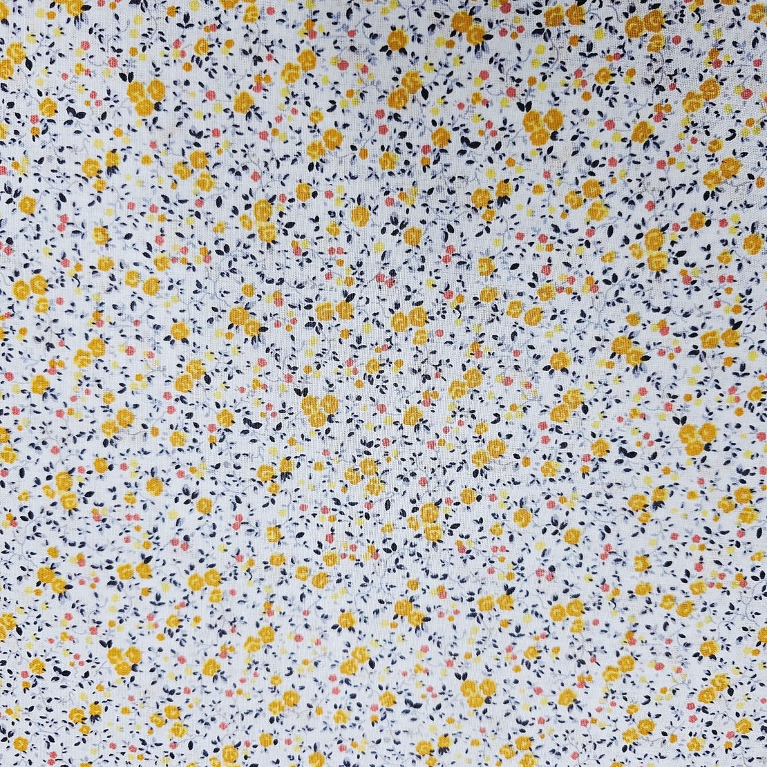 אריג כותנה פרחים קטנים בגווני צהוב דגם שרון