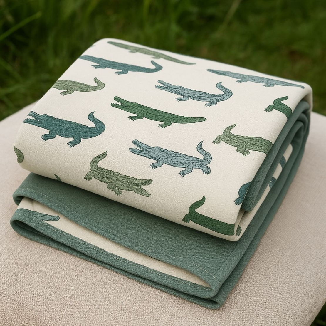 טריקו דפוס תנינים על רקע אופוייט