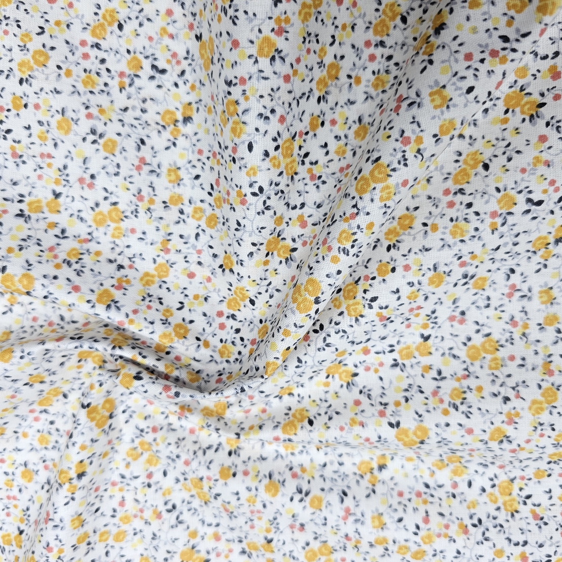 אריג כותנה פרחים קטנים בגווני צהוב דגם שרון