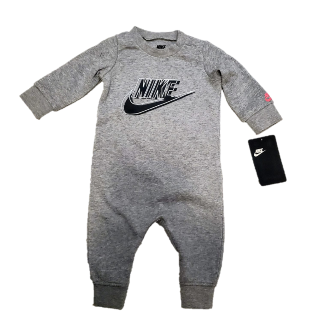 אוברול NIKE אפור מנצנץ כיתוב שחור במרכז לוגו ורוד זוהר בכף יד