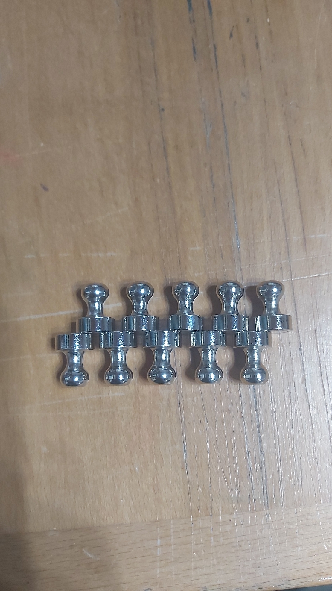 Strong magnets for holding parchment.