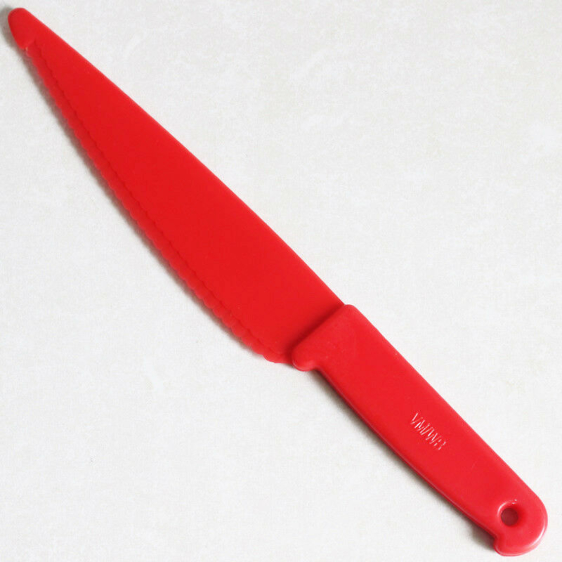 Red chef's knife made of durable and non-toxic plastic