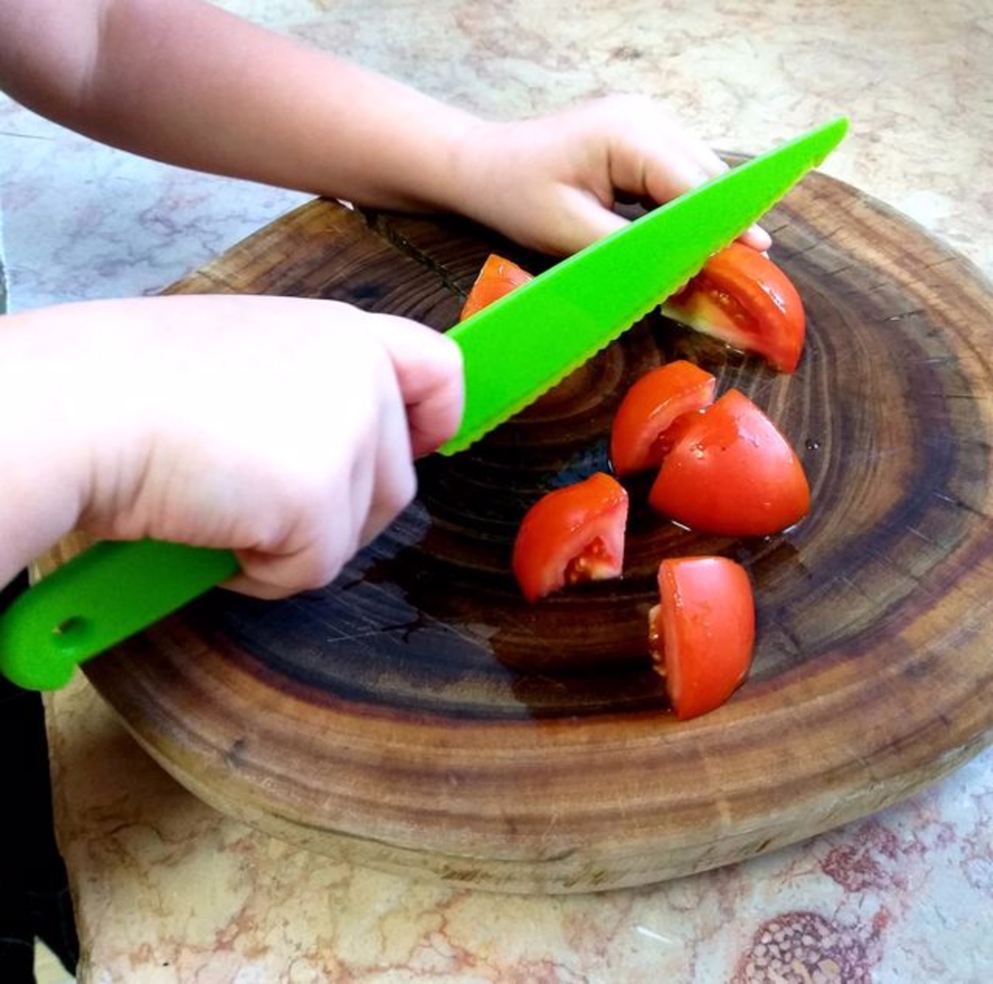 A pair of safe chef knives for children