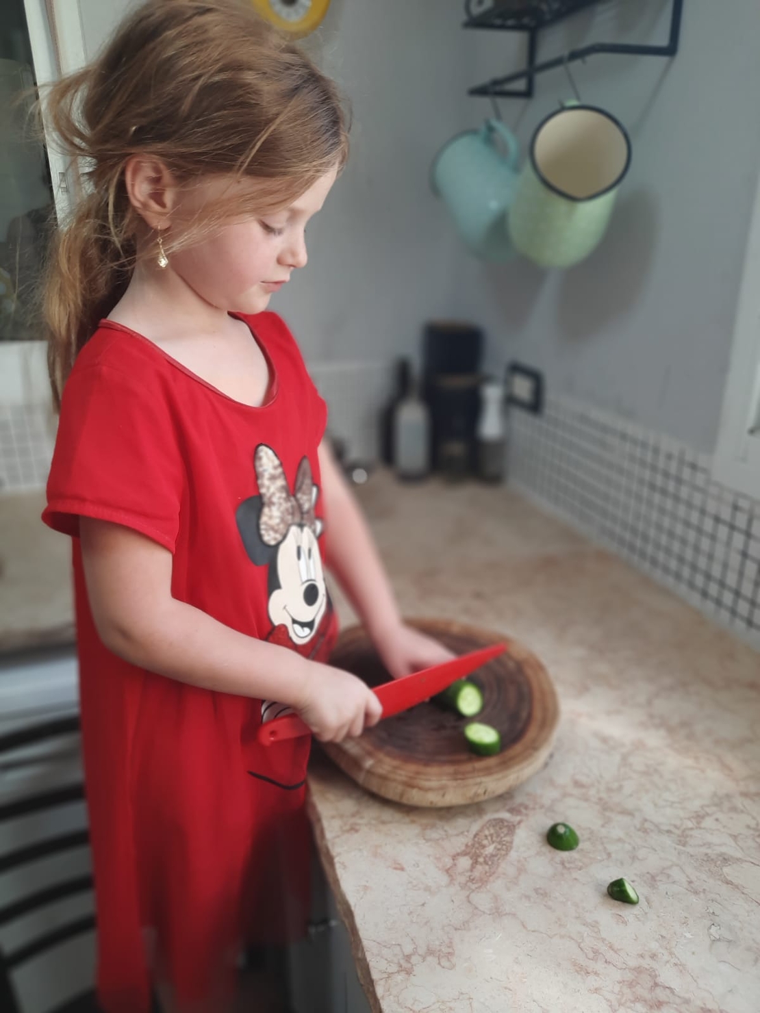 Red chef's knife made of durable and non-toxic plastic
