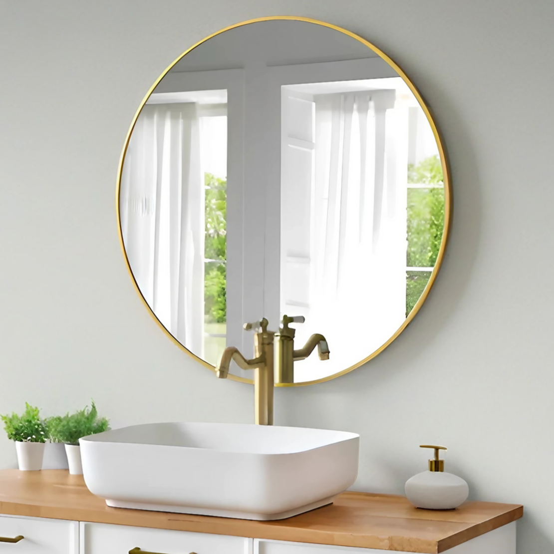 מראה עגולה עם מסגרת זהב