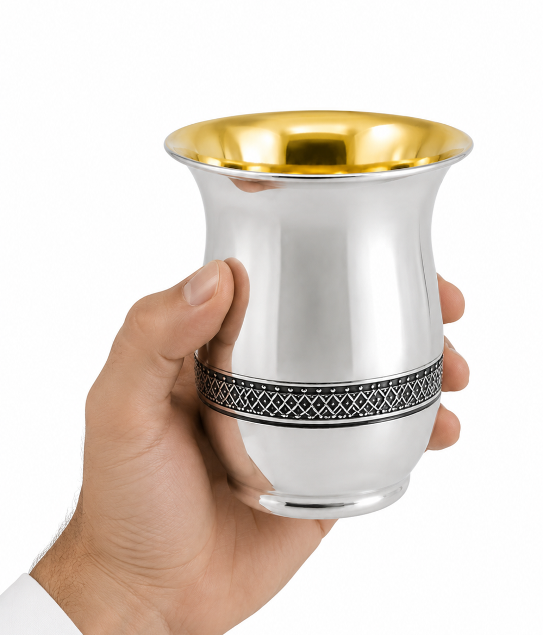 A hand holding a handmade Kiddush cup decorated with filigree, 925 sterling silver