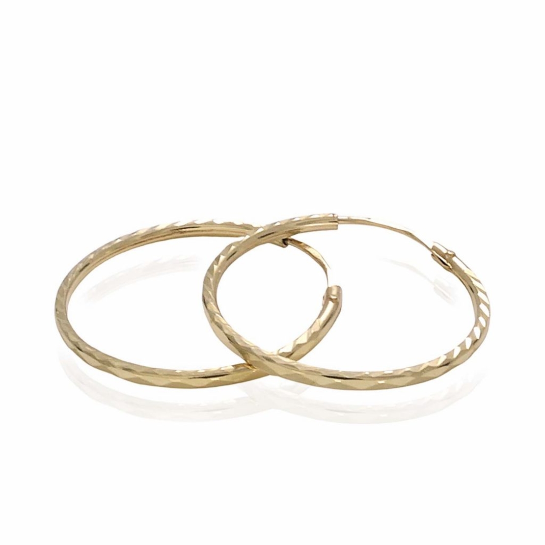 14K gold hammered hinge hoop piercing