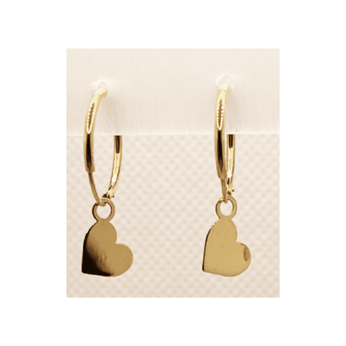 14K gold hoop with a pendant element of a heart