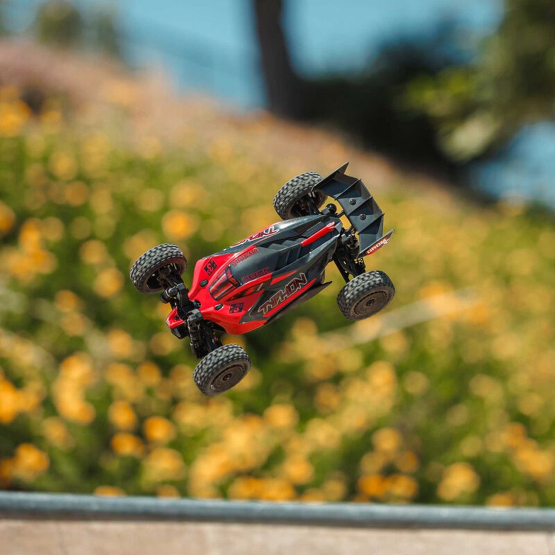 מכונית Arrma Typhon Grom BLX 223S DSC 4X4 RTR 1/14 (כולל סוללה ומטען) אדום