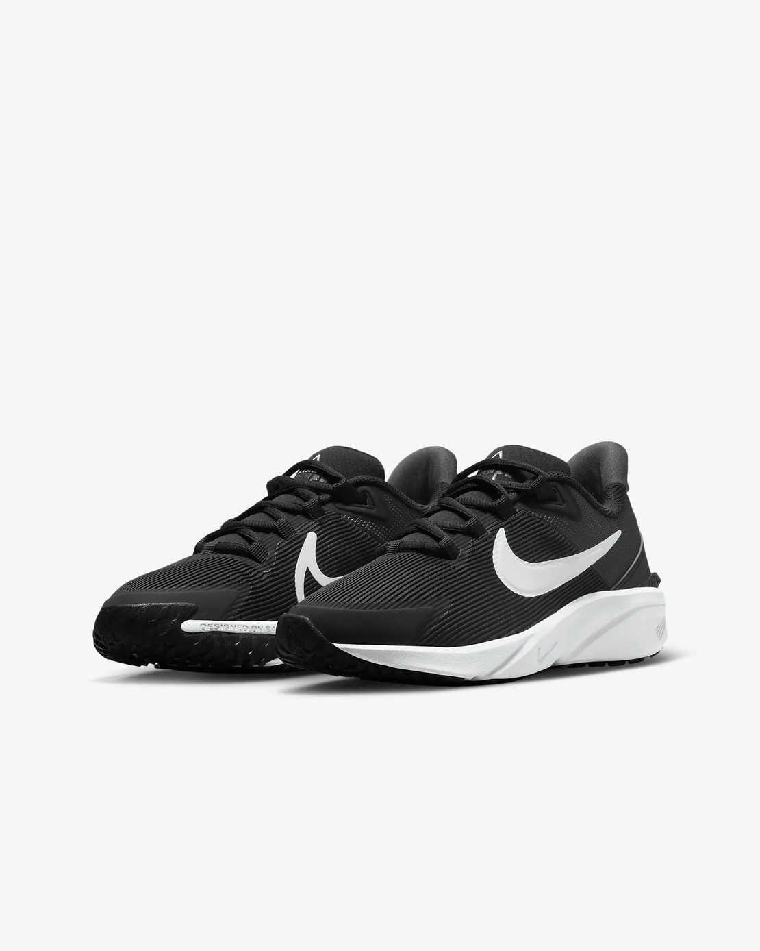 NIKE Star Runner 4 נוער שחור לבן