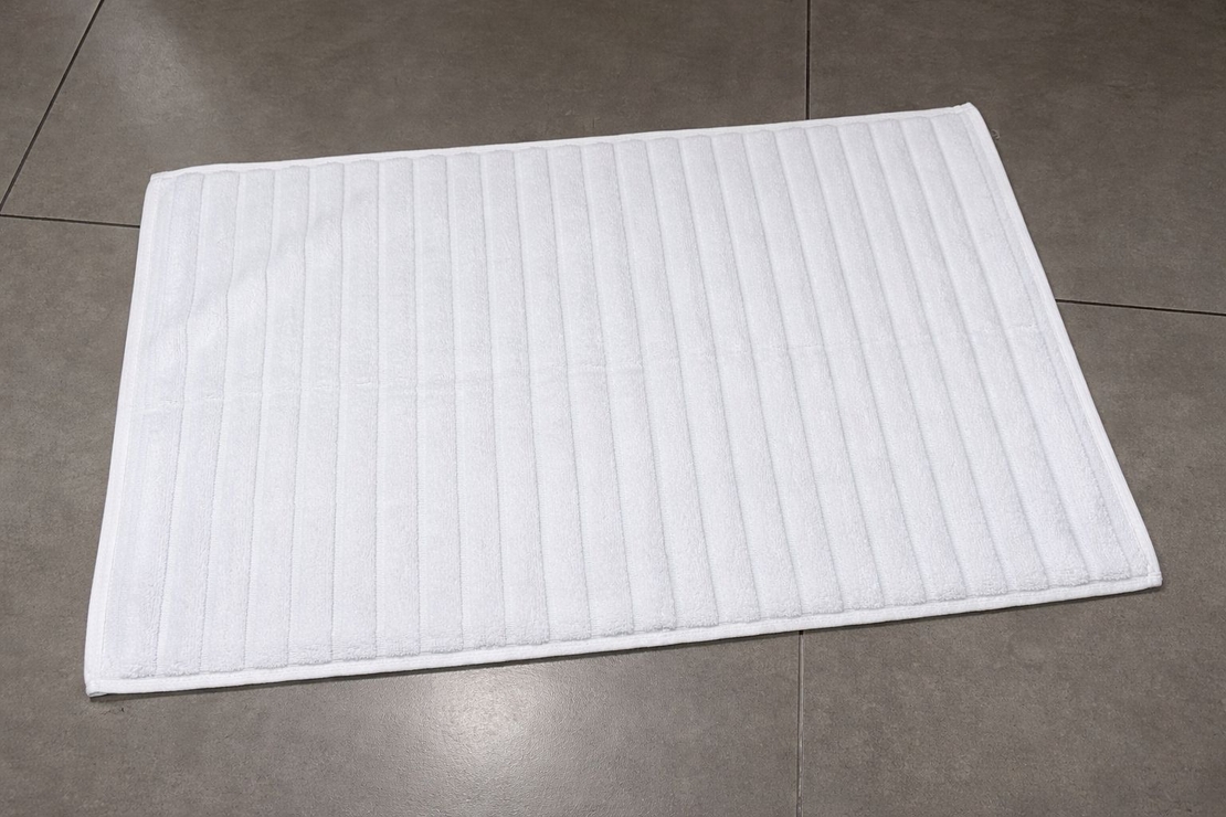 שטיח אמבטיה 70*50 גלים  לבן
