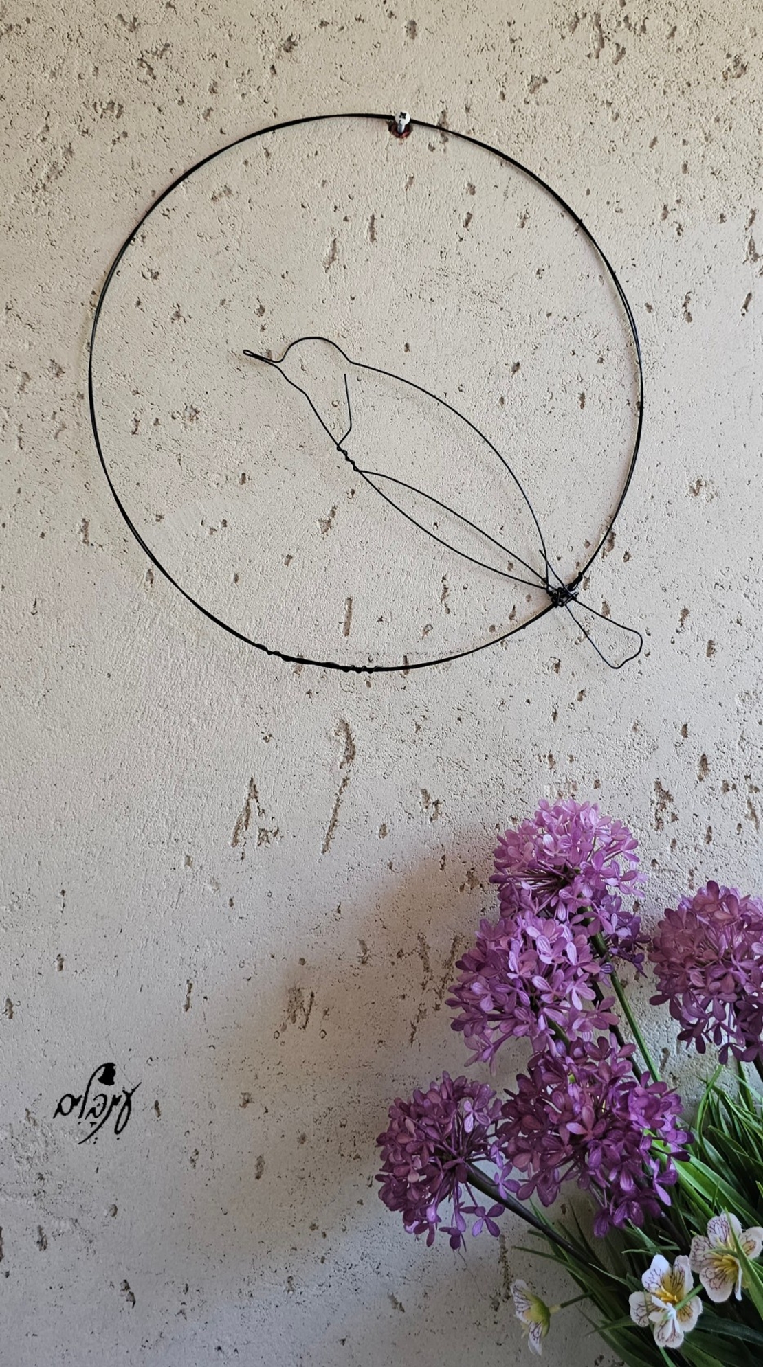 תמונת ציפור עגולה מחוט ברזל