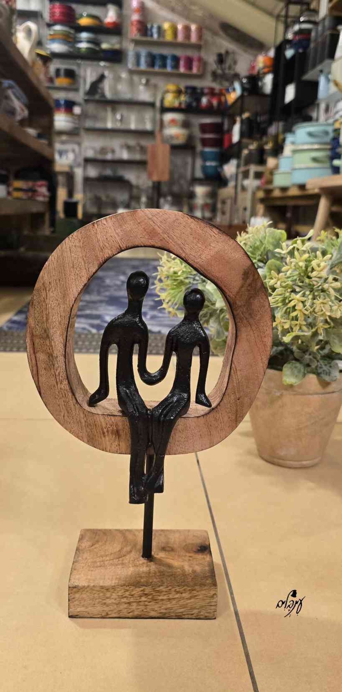 פסל זוג בעיגול