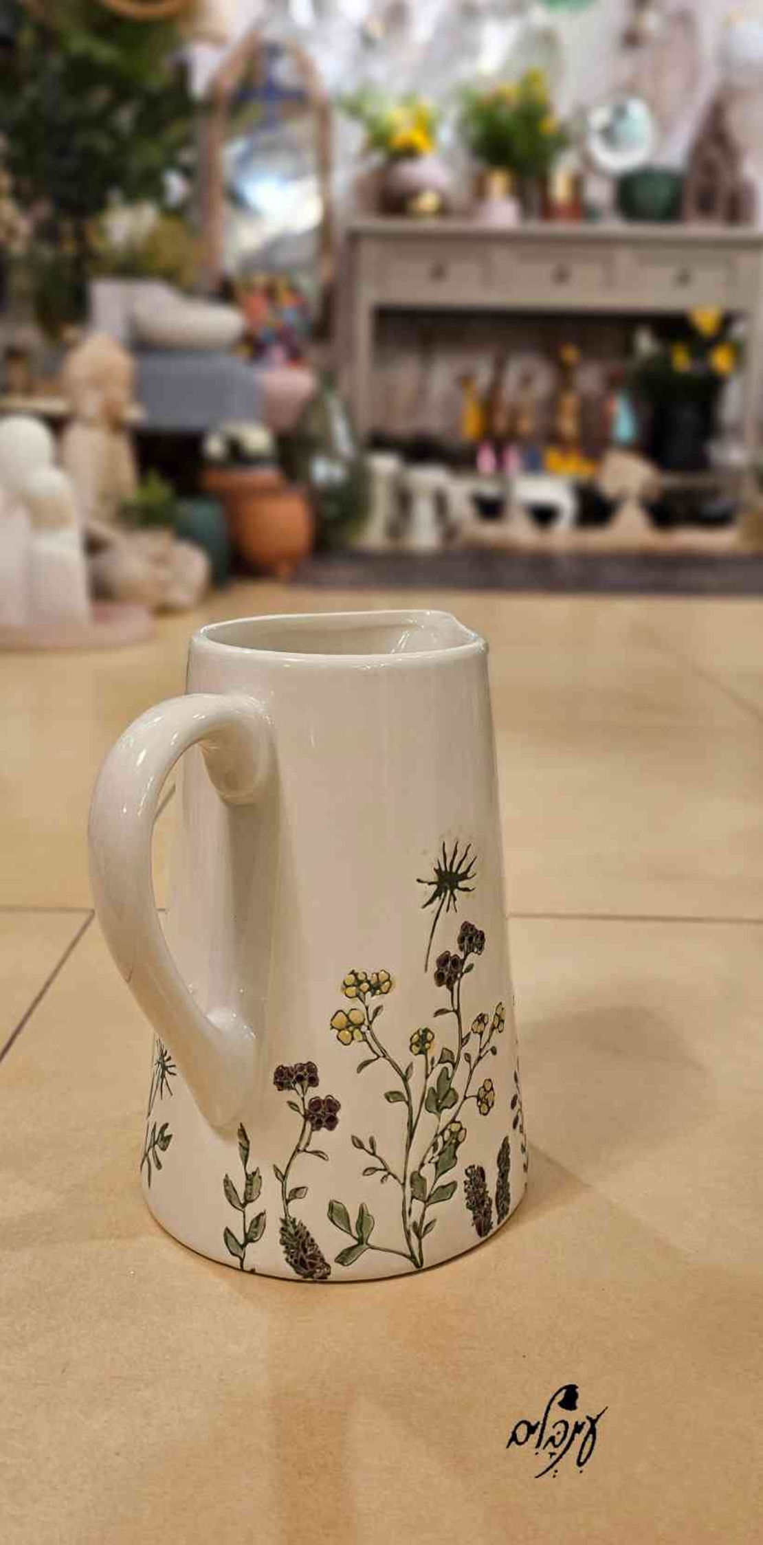 קנקן קרמיקה מעוטר