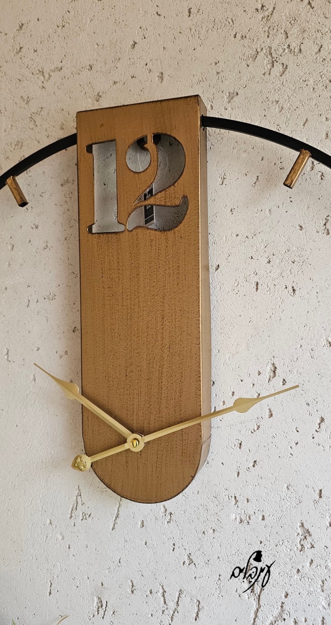 שעון קיר ברזל 12