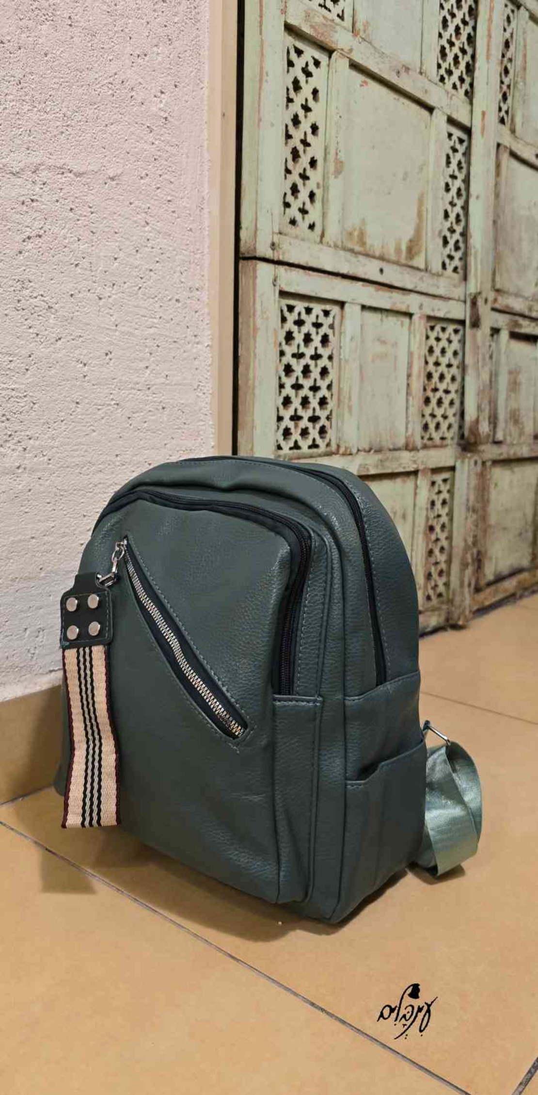 תיק גב דגם סירטי ירוק