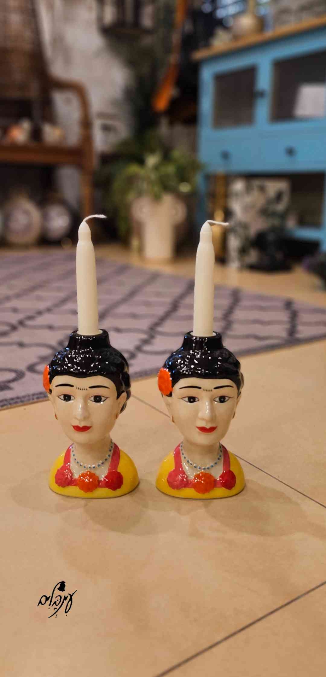 זוג פמוטי פרידה קאלו אדום