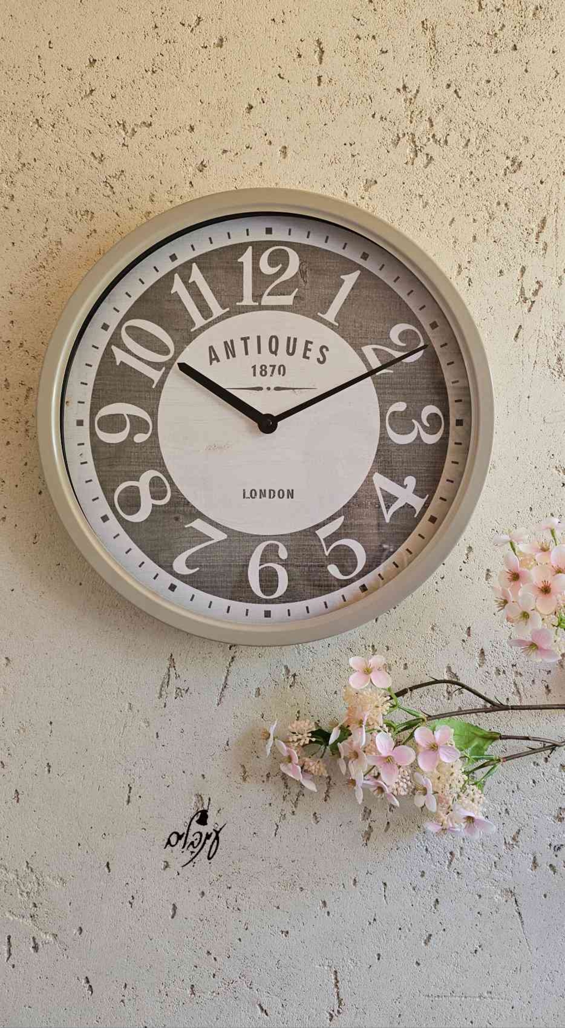 שעון קיר מעוצב אפרפר