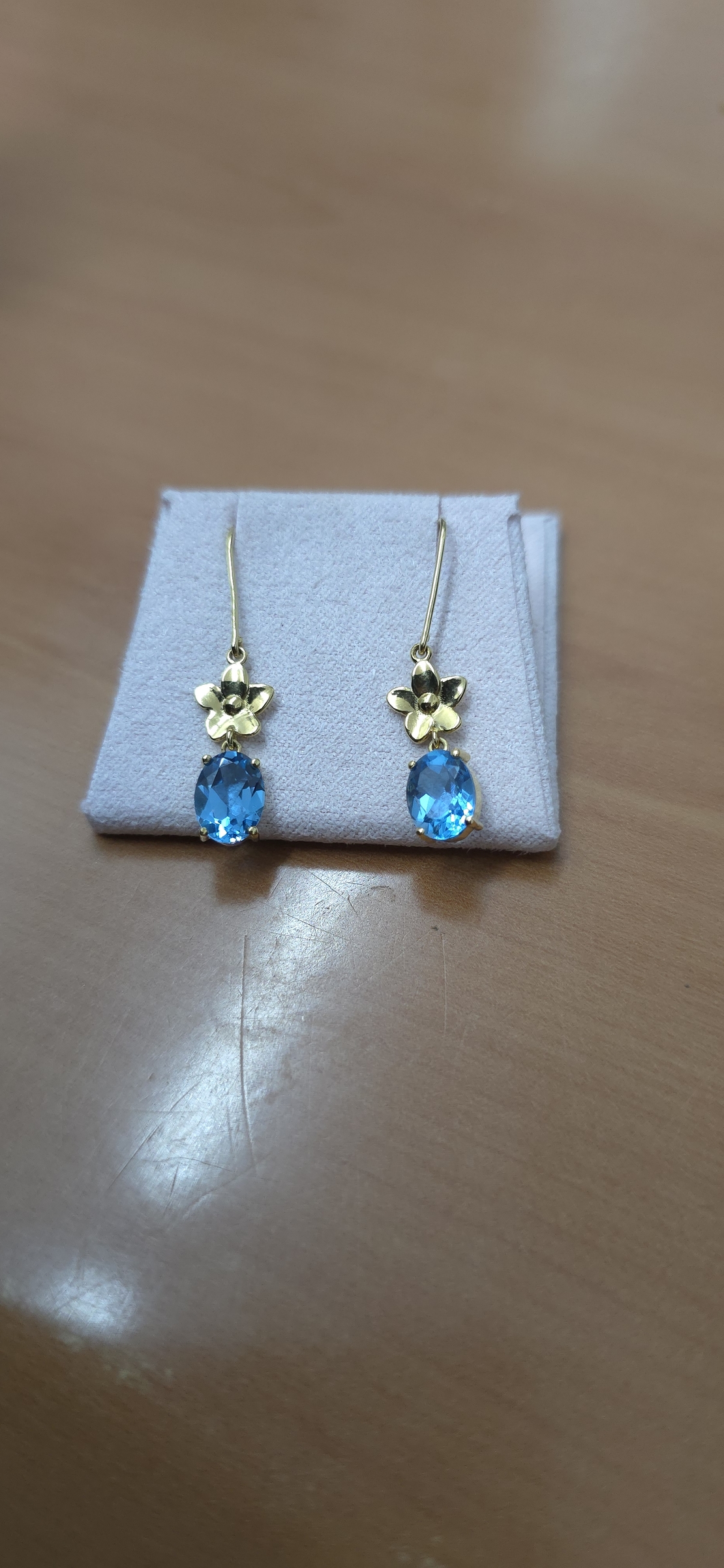 Gold earrings set with Blue Topaz Suisse stones Model EAG16