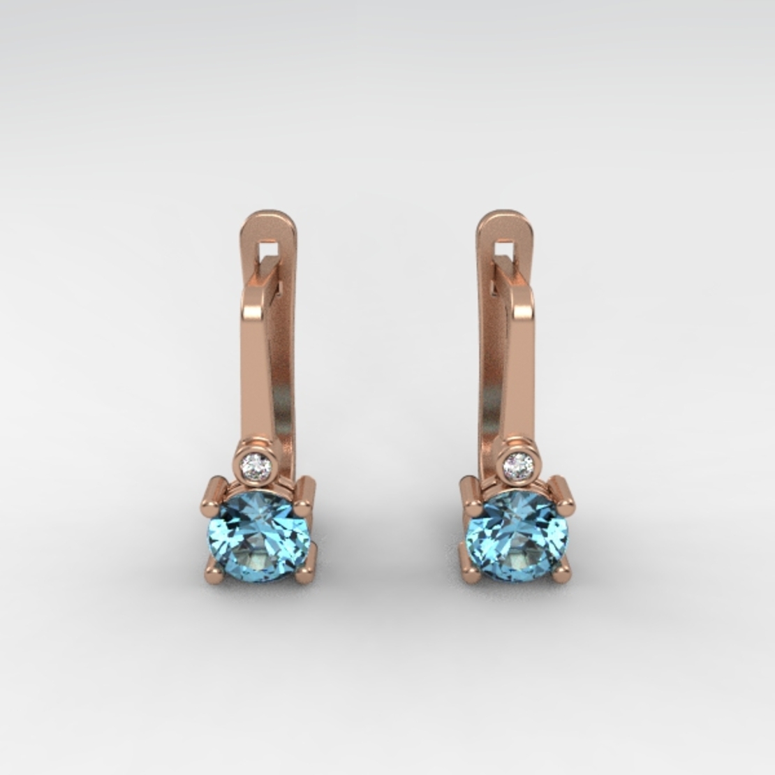 Earrings made of 14k gold set with Blue Topaz Suisse stones and diamonds model EAG36